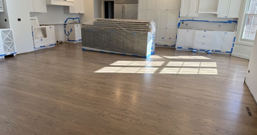 Kitchen cabinets sealed with dust containment before sanding